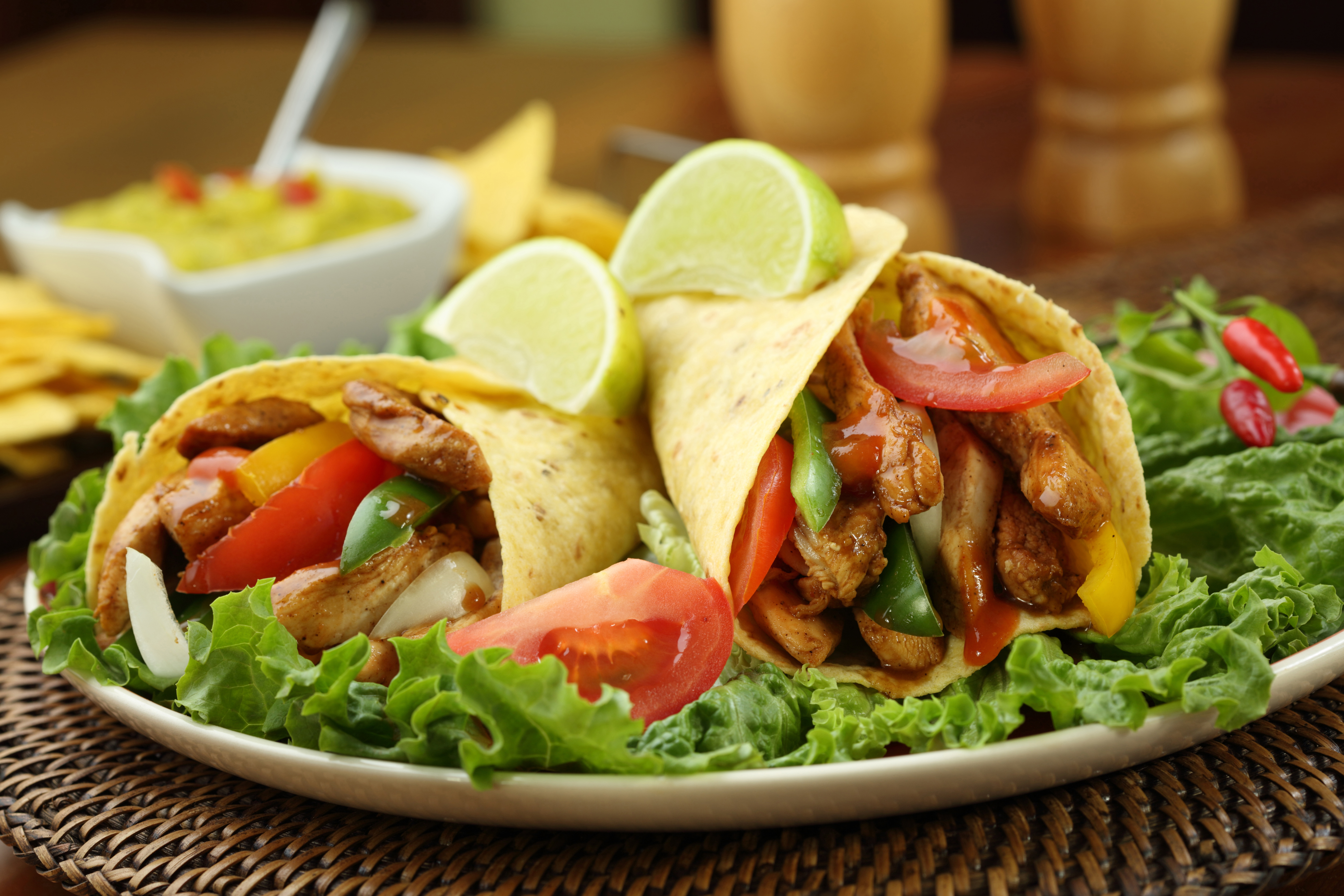 chicken fajita  with guacamole and tortillas – dish of mexico